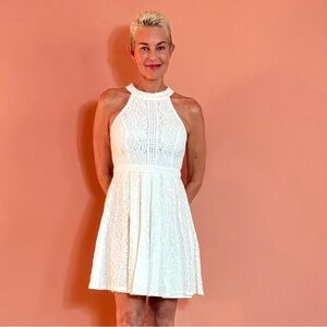 Aqua halter style neckline white lacy mini dress.